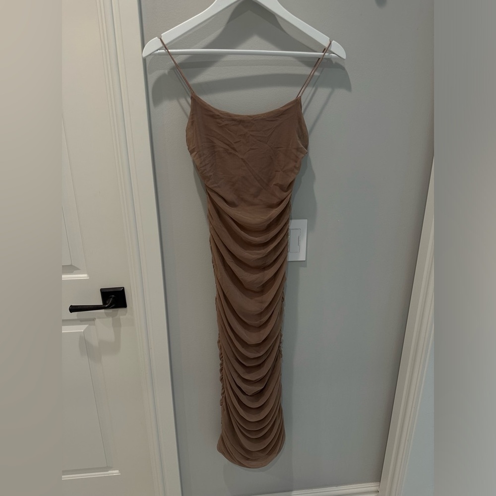 Midi length scrunch dress. So flattering. True to Size.